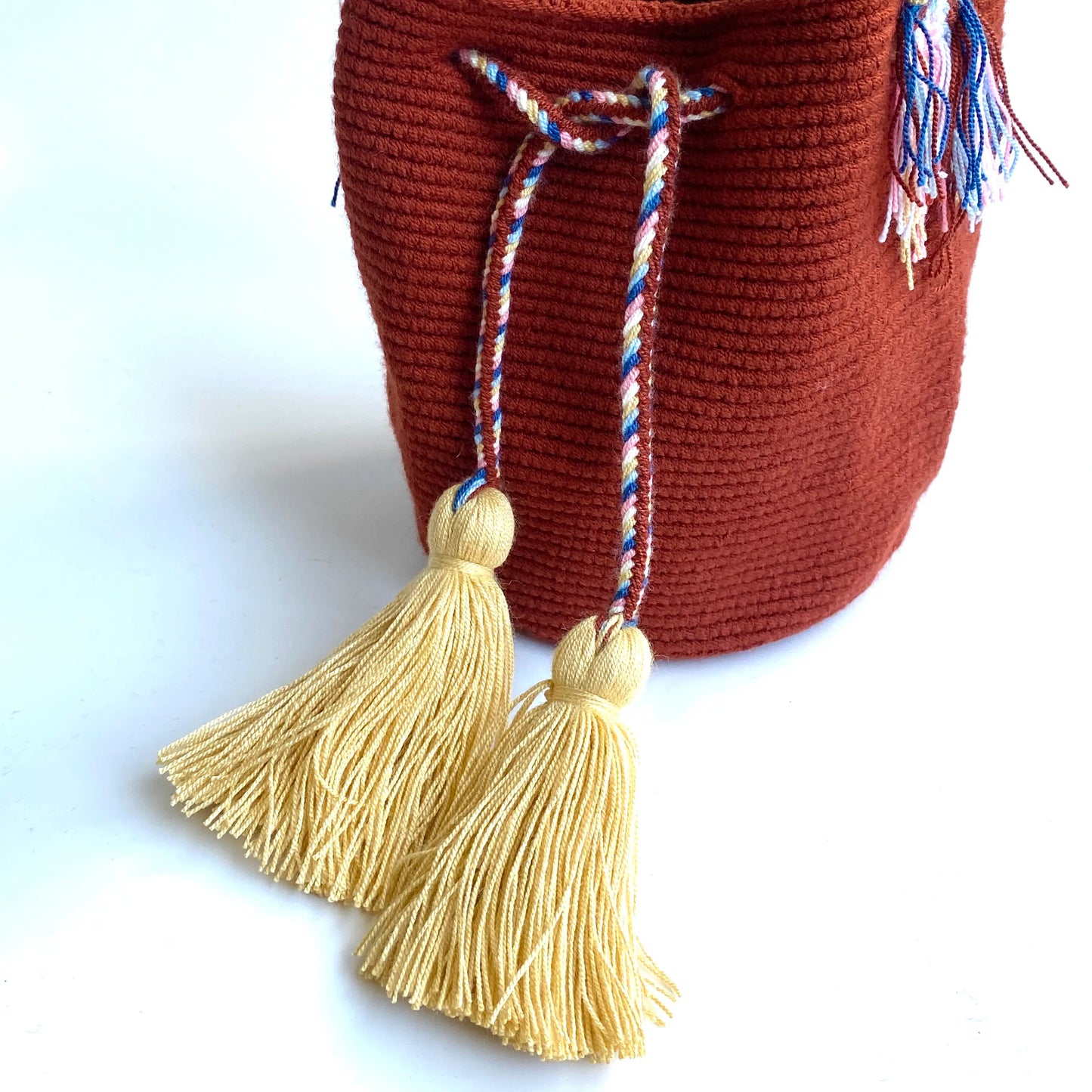 La Narrativa: Colombian Indigenous Wayuu Handwoven Mochila Fringe Handbag in Brick Red | One-of-a-Kind Fair Trade